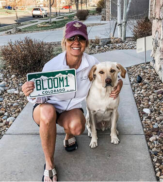 Bloom owner Amy Hayes with her dog Caz